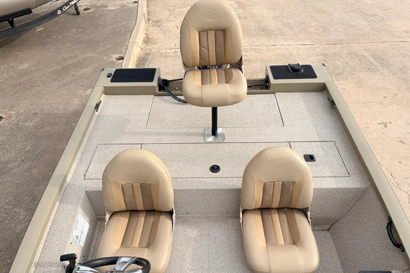 Slide: The Image of 2021 G3 Sportsman 1610 boat interior with three beige seats. - 26