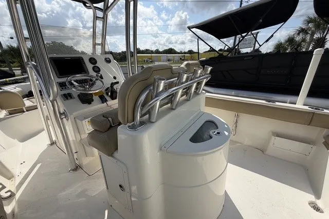 Slide: The Image of 2017 Key West 239 FS boat interior with helm and seating area. - 10