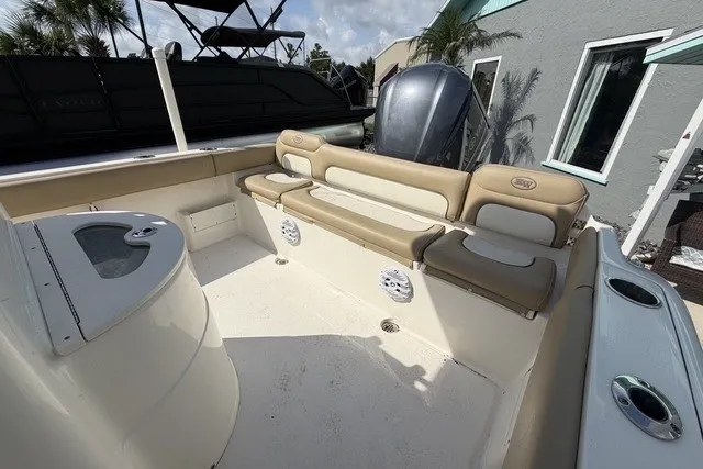Slide: The Image of 2017 Key West 239 FS boat interior with cushioned seating and modern design. - 9