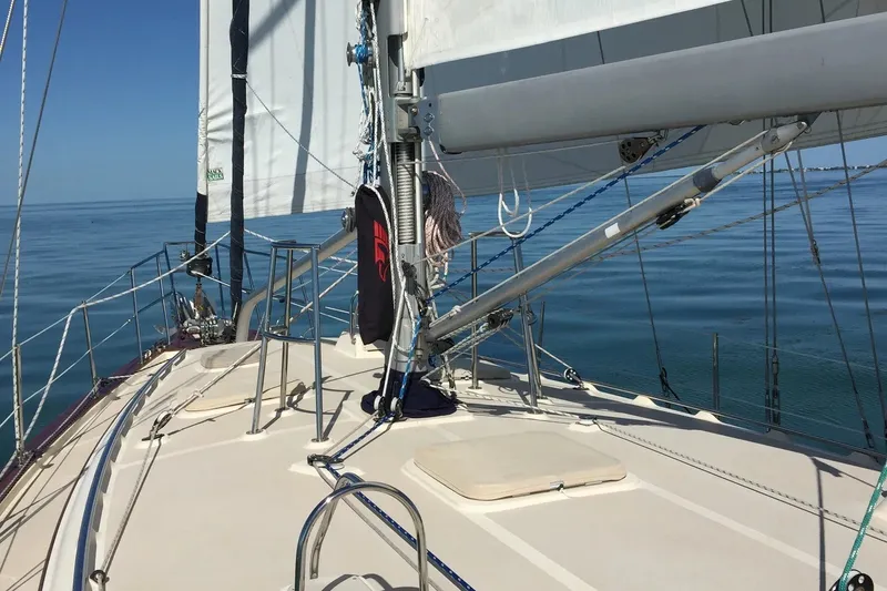 Slide: The Image of Sailing on a 2006 Island Packet 440 yacht with clear blue skies and calm waters. - 20
