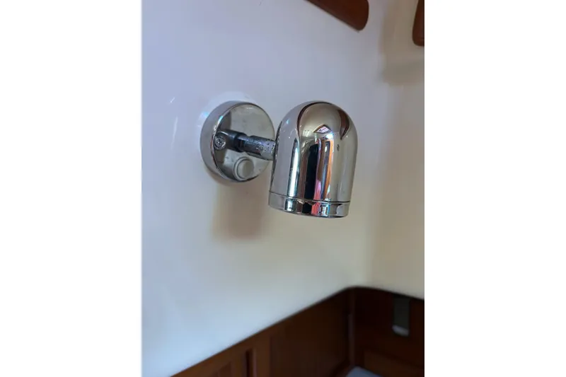 Slide: The Image of Chrome wall-mounted light fixture on 2006 Island Packet 440 yacht interior. - 73