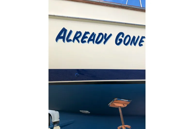 Slide: The Image of Island Packet 440 sailboat, 2006, with "Already Gone" name on hull. - 33