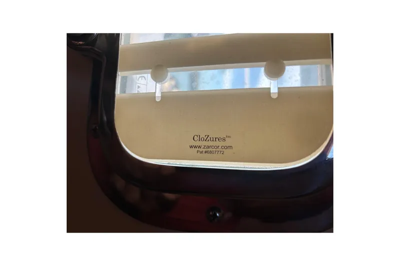 Slide: The Image of Portlight with CloZures shade on 2006 Island Packet 440 yacht. - 19