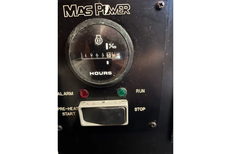 Slide: The Image of Hour meter panel on 2006 Island Packet 440 sailboat, showing 1963.3 hours. - 27
