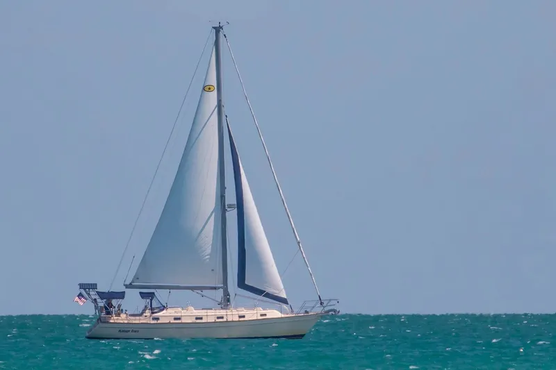 Slide: The Image of Sailing yacht Island Packet 440, 2006 model, cruising on open sea. - 74