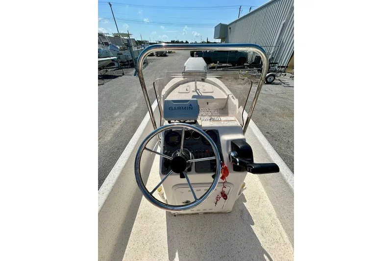 Slide: The Image of 2019 Carolina Skiff 17 JV CC boat console with Garmin navigation system. - 17