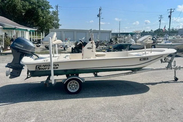 Slide: The Image of 2019 Carolina Skiff 17 JV CC boat on trailer with Yamaha outboard motor. - 9