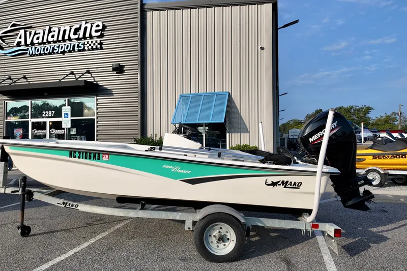 The Image of 2023 Mako Pro Skiff 13 CC boat on trailer at Avalanche Motorsports. - 1