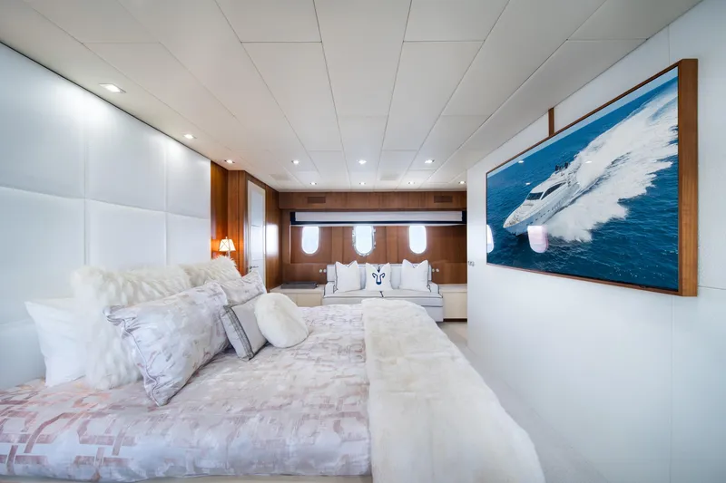 Slide: The Image of Luxurious bedroom interior on 2008 Arno Leopard 31 yacht, featuring elegant decor and ocean view. - 40