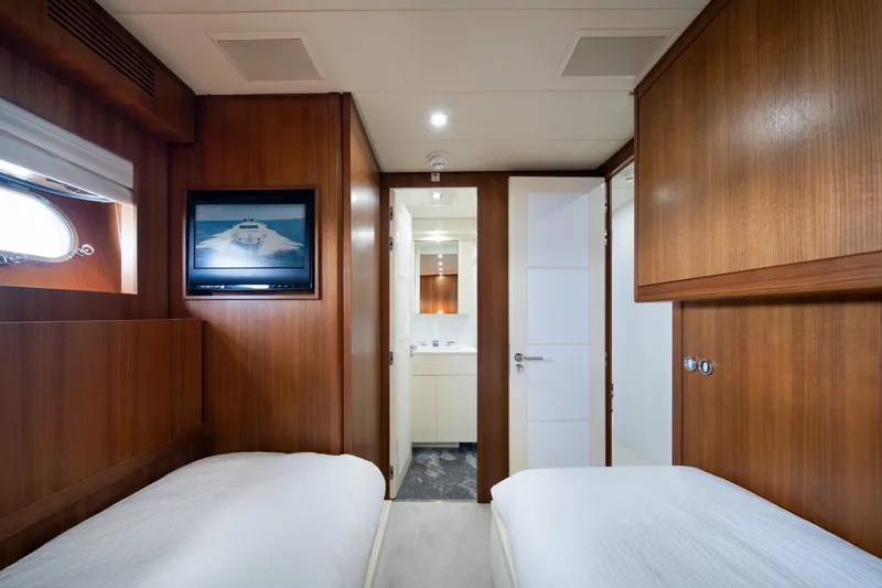 Slide: The Image of Luxurious cabin interior of 2008 Arno Leopard 31 yacht with twin beds and wooden finish. - 55