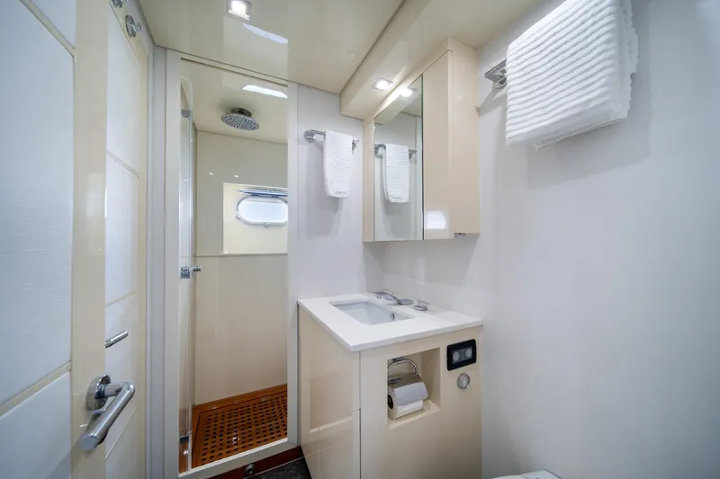Slide: The Image of Luxurious bathroom in 2008 Arno Leopard 31 yacht, featuring modern fixtures and elegant design. - 56