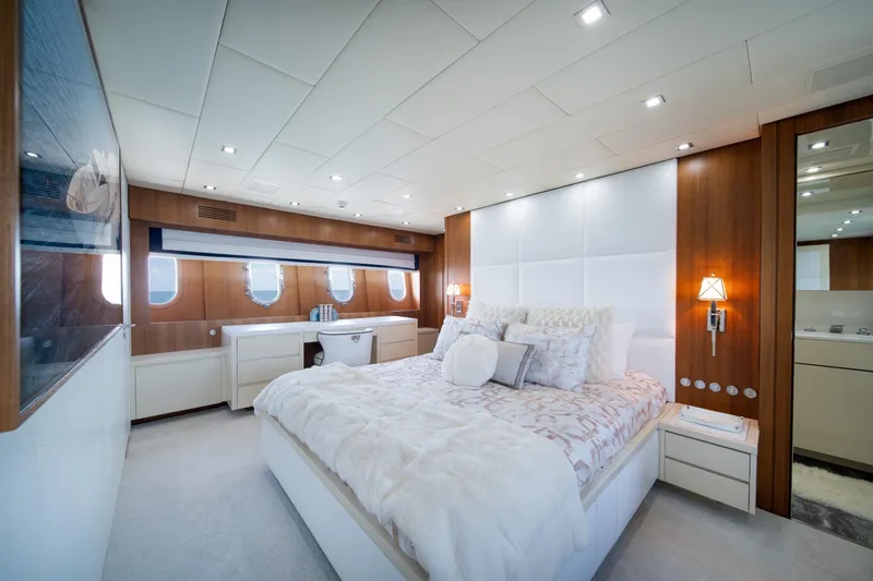 Slide: The Image of Luxurious bedroom interior on 2008 Arno Leopard 31 yacht, featuring elegant decor and modern lighting. - 37