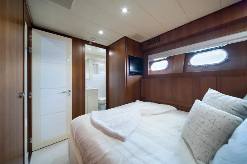 Slide: The Image of Luxurious cabin interior of 2008 Arno Leopard 31 yacht with cozy bed and ensuite bathroom. - 51