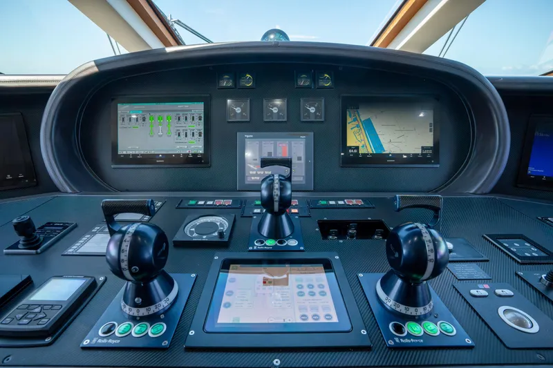 Slide: The Image of Control panel of a 2008 Arno Leopard 31 yacht with advanced navigation systems. - 35
