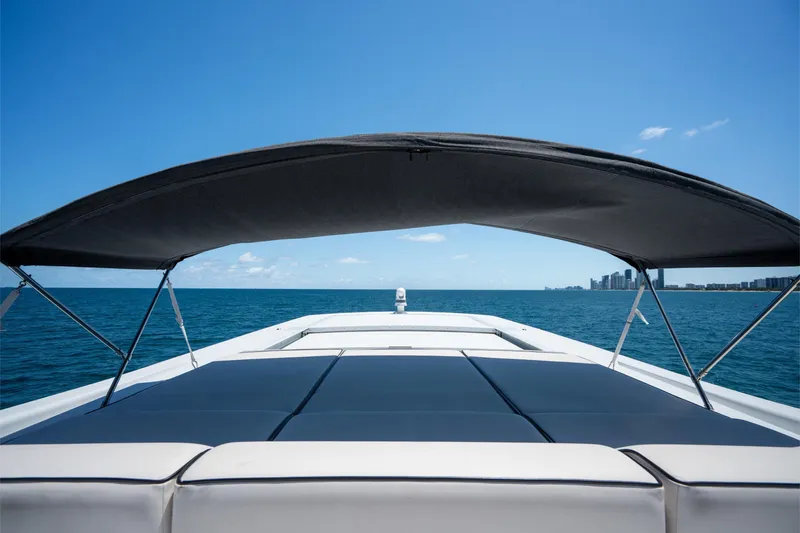 Slide: The Image of Luxury yacht Arno Leopard 31, 2008 model, cruising on open sea under clear blue sky. - 66