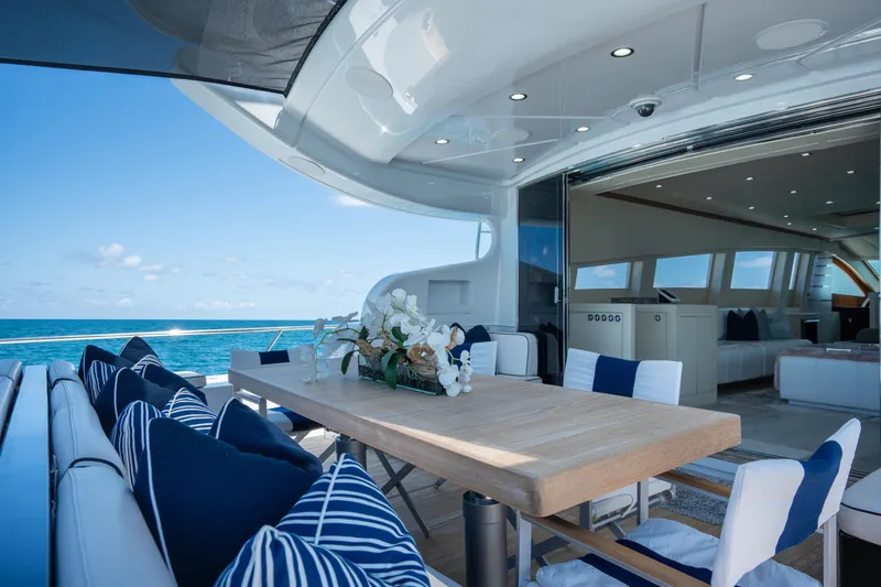 Slide: The Image of Luxurious 2008 Arno Leopard 31 yacht with elegant outdoor seating and ocean view. - 21
