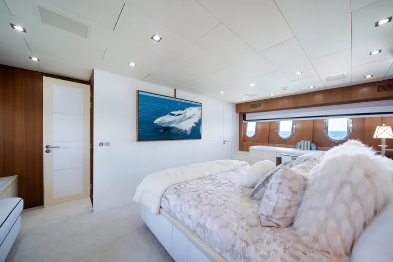 Slide: The Image of Luxurious bedroom interior on 2008 Arno Leopard 31 yacht, featuring elegant decor and ocean view. - 39