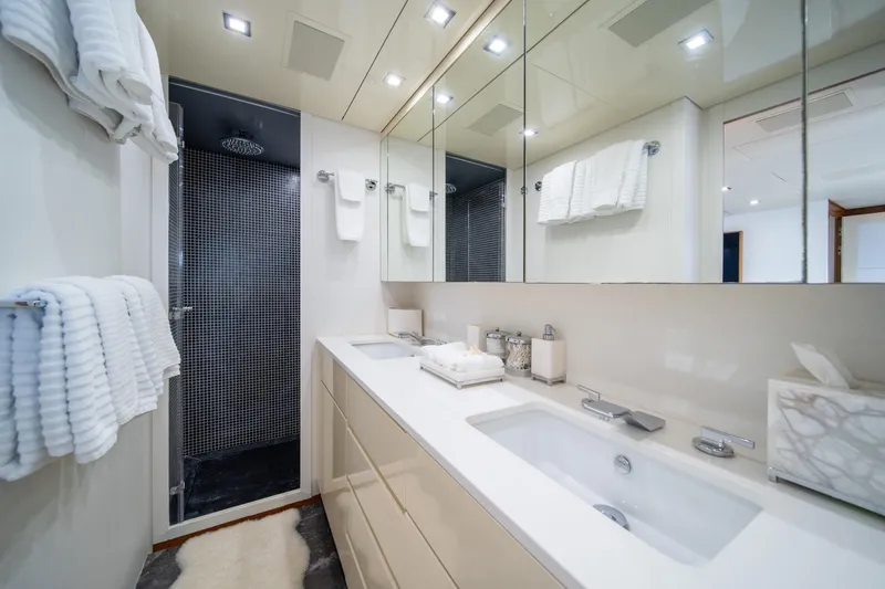 Slide: The Image of Luxurious yacht bathroom with modern fixtures, double sink, and elegant shower in Arno Leopard 31, 2008. - 42