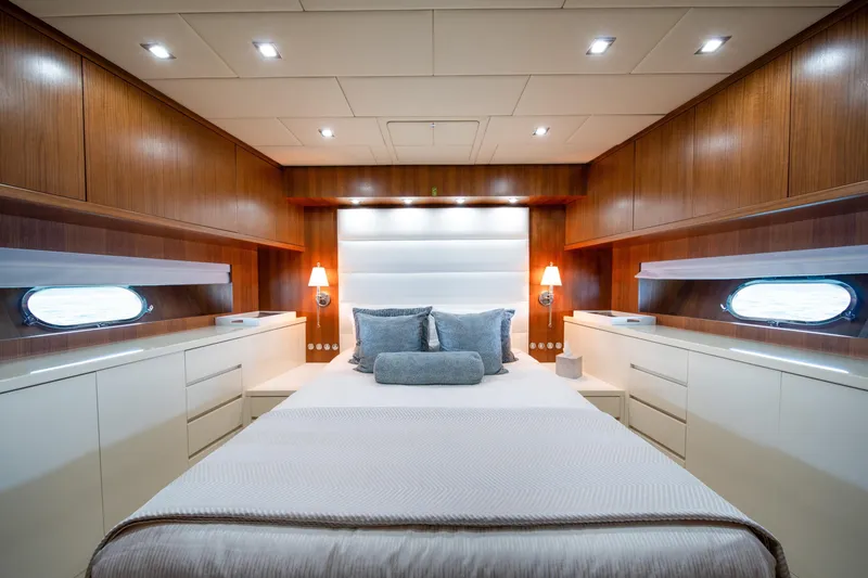 Slide: The Image of Luxurious bedroom interior of 2008 Arno Leopard 31 yacht with elegant wood paneling. - 43