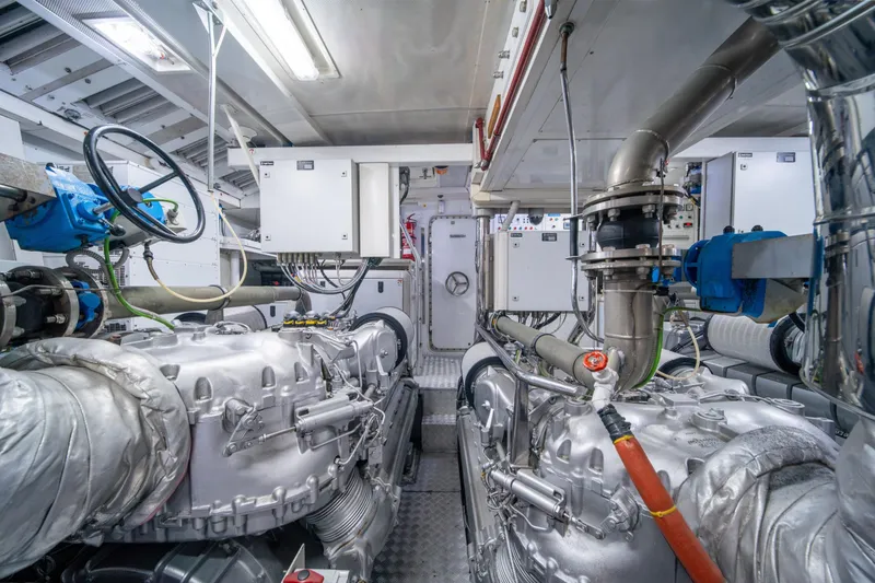 Slide: The Image of Engine room of a 2008 Arno Leopard 31 yacht, showcasing machinery and equipment. - 72