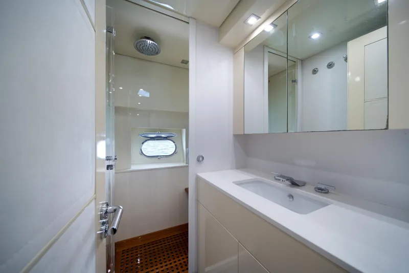 Slide: The Image of Luxurious bathroom interior on 2008 Arno Leopard 31 yacht, featuring modern fixtures and elegant design. - 47