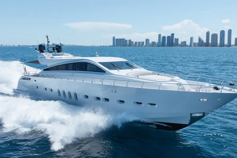 Slide: The Image of Luxury Arno Leopard 31 yacht cruising on ocean, city skyline in background, 2008 model. - 1