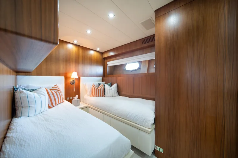 Slide: The Image of Luxurious cabin interior of 2008 Arno Leopard 31 yacht with twin beds and wood paneling. - 53