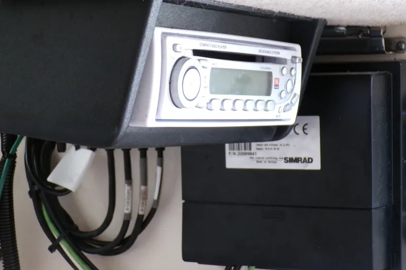 Slide: The Image of Boat stereo system and Simrad equipment on a 2005 Grady-White Seafarer 226. - 21