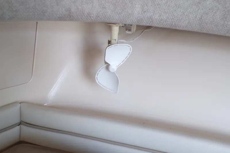 Slide: The Image of Small white fan inside 2005 Grady-White Seafarer 226 boat cabin. - 19