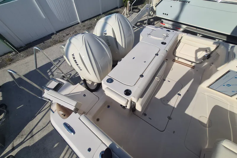 Slide: The Image of 2027 Grady-White Freedom 325 boat with dual Yamaha outboard engines, viewed from above. - 19