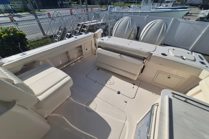 Slide: The Image of Spacious deck of 2027 Grady-White Freedom 325 boat with seating and storage. - 14