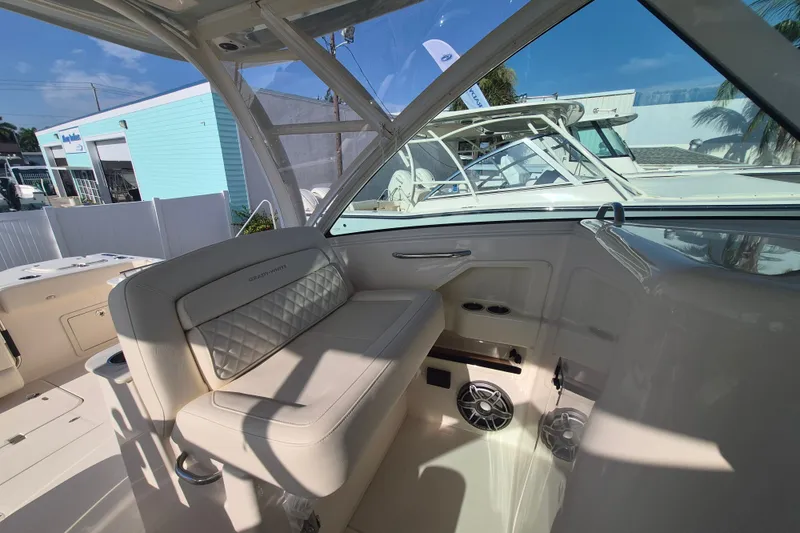 Slide: The Image of Interior view of 2027 Grady-White Freedom 325 boat with luxurious seating and modern design. - 15
