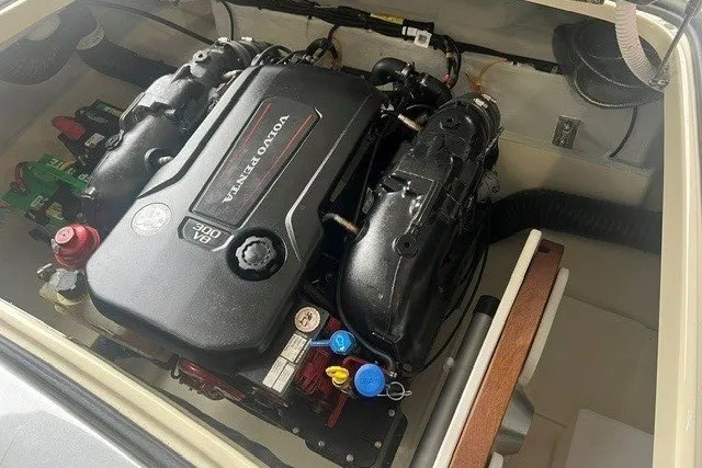Slide: The Image of The engine compartment of a 2019 Chris-Craft Launch 23 features a Volvo Penta engine. - 15
