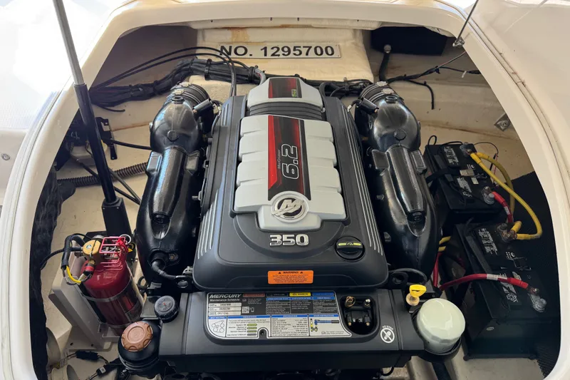 Slide: The Image of Engine compartment of 2019 Chaparral 264 Sunesta with Mercury 6.2L 350 HP engine. - 13