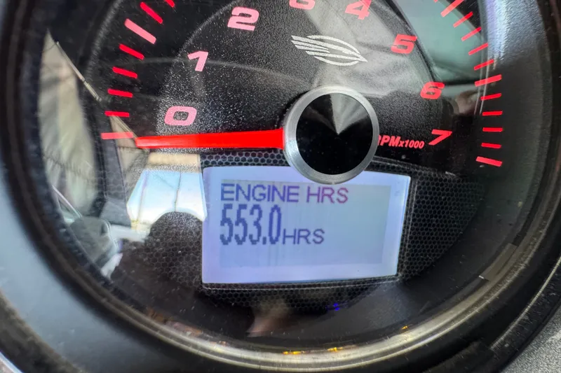 Slide: The Image of Close-up of 2019 Chaparral 264 Sunesta tachometer showing 553 engine hours. - 20