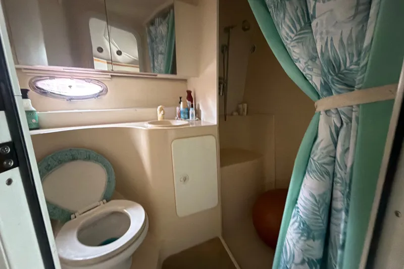 Slide: The Image of Bathroom interior of 1995 Cruisers Yachts 3570 Esprit with shower and toilet. - 34
