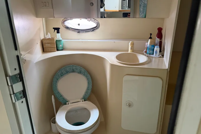 Slide: The Image of Bathroom interior of 1995 Cruisers Yachts 3570 Esprit with toilet and sink. - 36