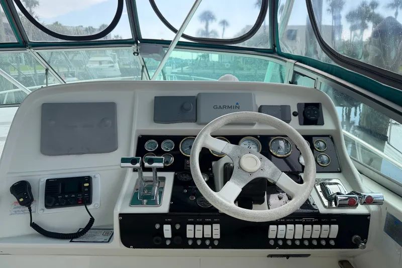 Slide: The Image of Cockpit of 1995 Cruisers Yachts 3570 Esprit with Garmin navigation system and control panel. - 21