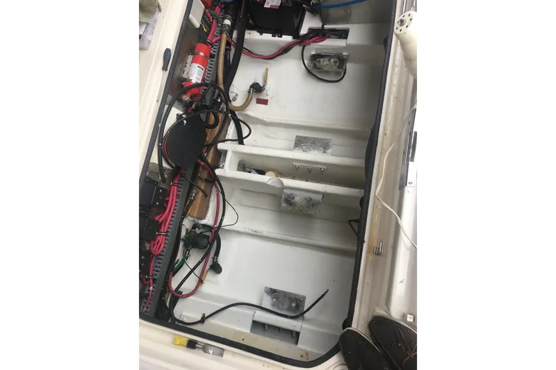 Slide: The Image of Engine compartment of a 2001 Regal Commodore 2760 boat, showing wiring and components. - 25