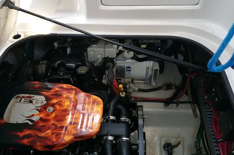 Slide: The Image of Engine compartment of 2001 Regal Commodore 2760 boat with Kohler power system. - 23