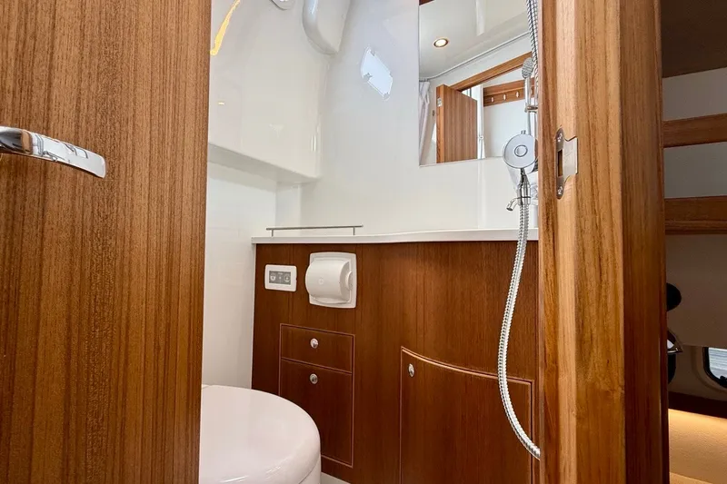Slide: The Image of Luxurious wooden bathroom interior in 2027 Targa 32 yacht. - 21