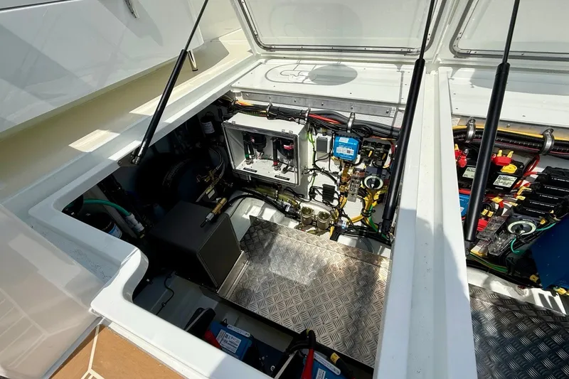 Slide: The Image of Engine compartment of 2027 Targa 32 boat, showcasing advanced mechanical systems and components. - 47