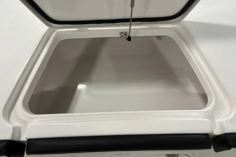 Slide: The Image of Open storage compartment on 2026 Tidewater 2300 Carolina Bay boat. - 30