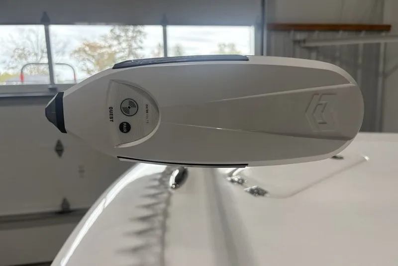 Slide: The Image of Close-up of a 2026 Tidewater 2300 Carolina Bay boat accessory in a garage setting. - 13