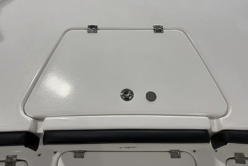 Slide: The Image of 2026 Tidewater 2300 Carolina Bay boat hatch with sleek design and secure latch. - 32