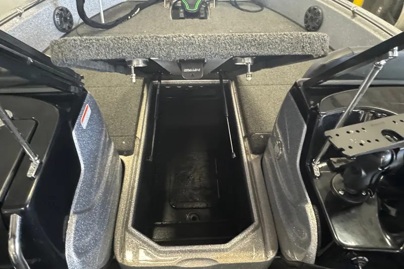 Slide: The Image of 2021 Nitro ZV19 Sport boat interior storage compartment with open hatches. - 13
