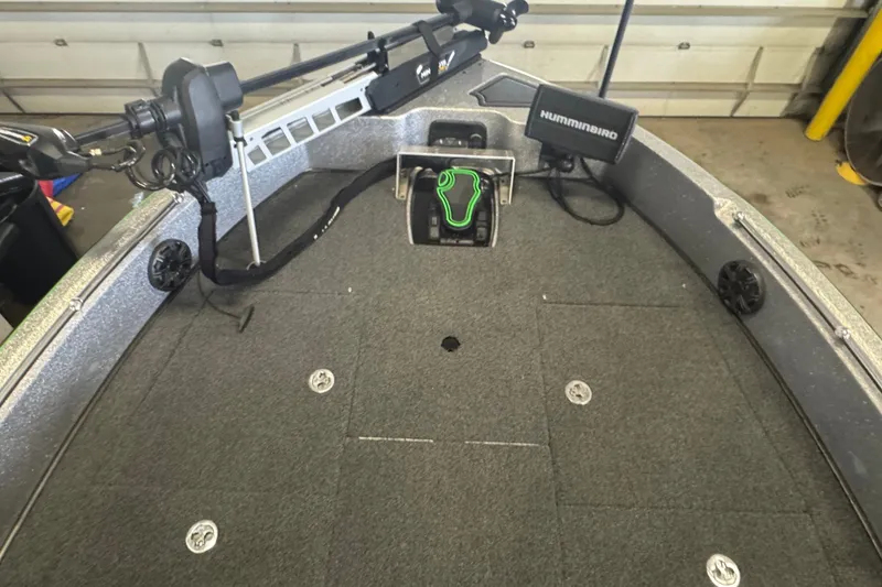 Slide: The Image of 2021 Nitro ZV19 Sport boat deck with Humminbird electronics and trolling motor. - 14