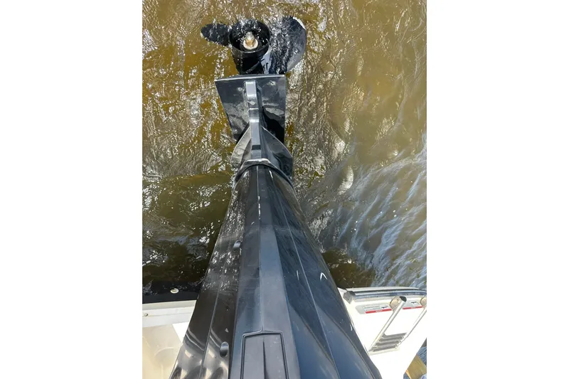Slide: The Image of 2023 Sea Ray SPX 210 Outboard motor in water, showcasing sleek design and functionality. - 11