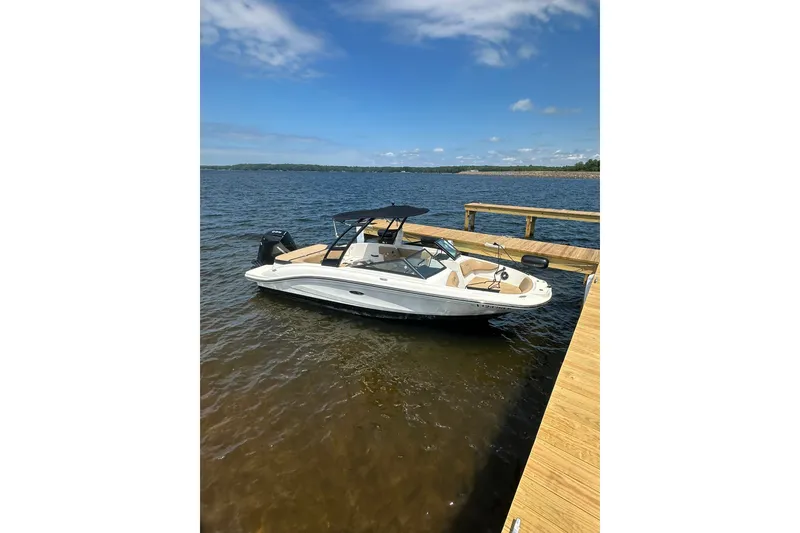 The Image of 2023 Sea Ray SPX 210 Outboard boat docked on a sunny day. - 1