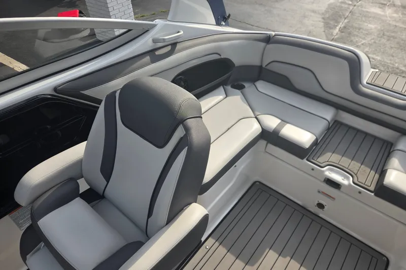 Slide: The Image of 2018 Yamaha Boats 212 Limited S interior with sleek seating and modern design. - 10